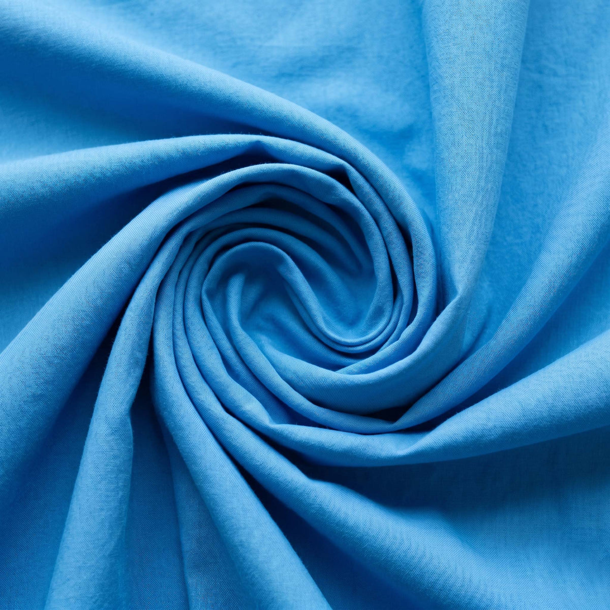 Close-up of the Bright Blue cotton fabric used in this matching set