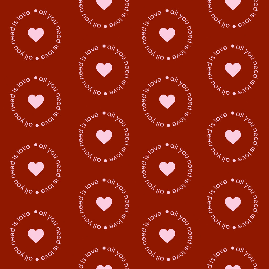 Deep red fabric print with circular love text and small heart motifs for nightwear