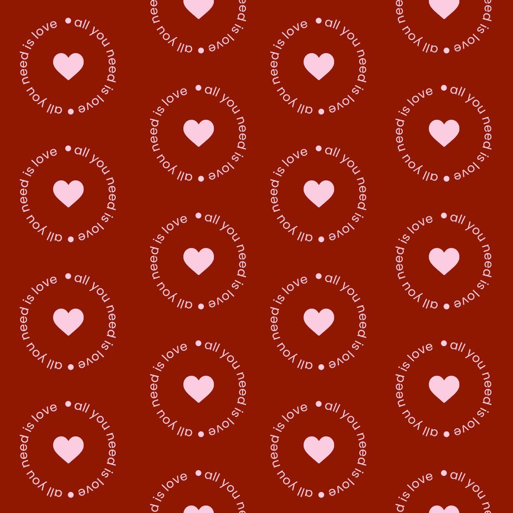 Deep red fabric print with circular love text and small heart motifs for nightwear