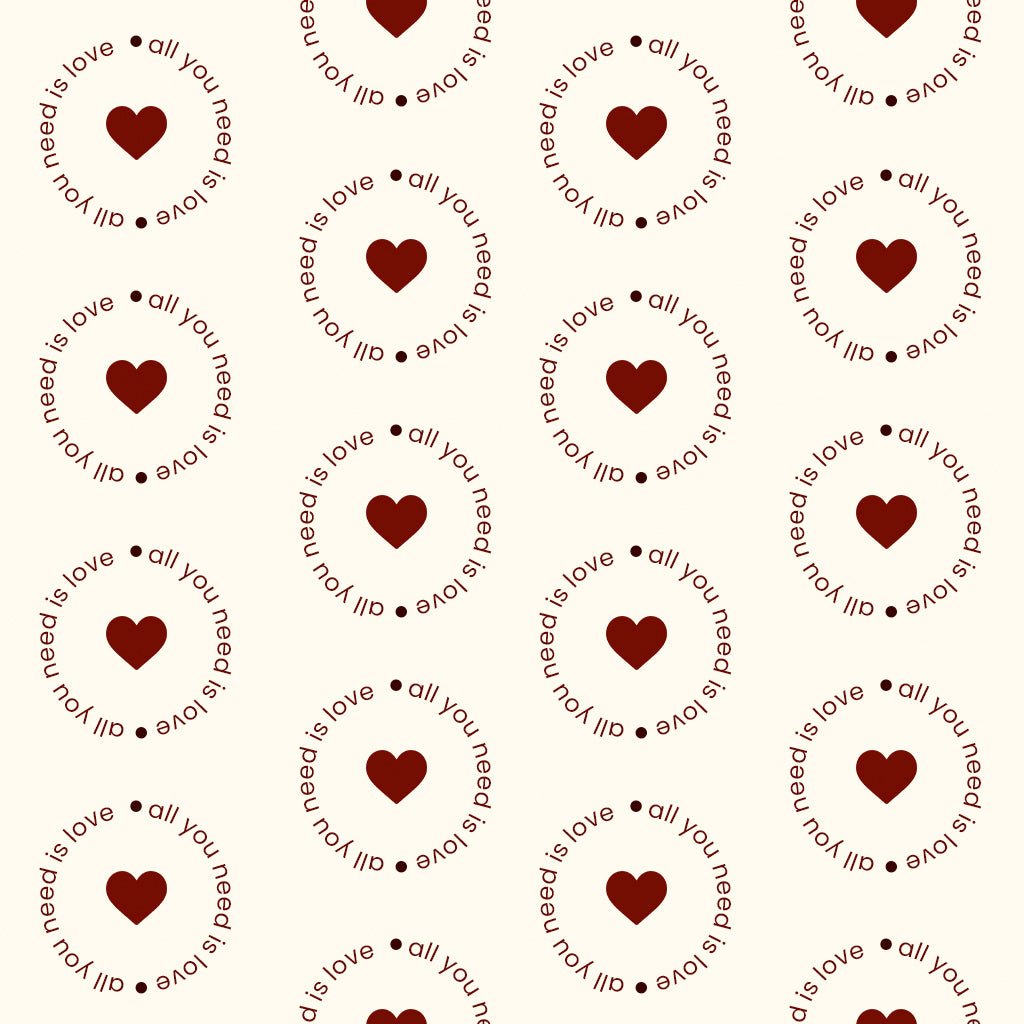 Soft cream fabric print featuring circular text and subtle heart details for pajamas