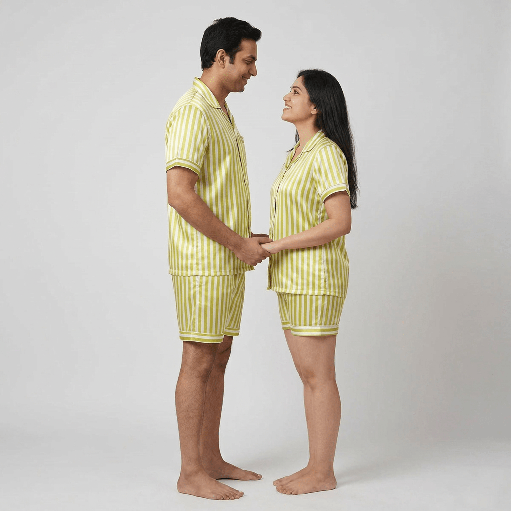 Husband and wife twinning in All Stripes half-sleeve night suit by Pajama Tribe