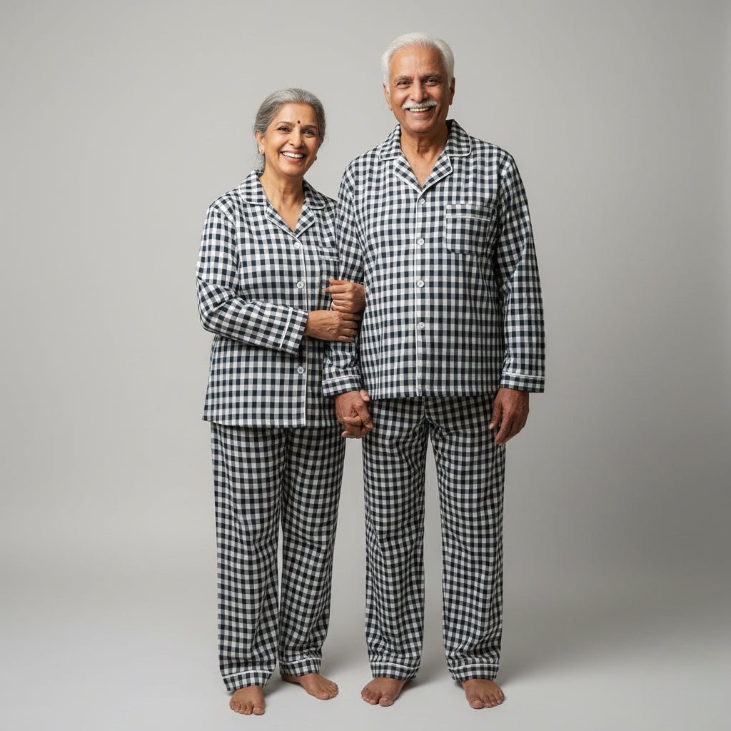 Elderly couple in black gingham matching pajama set, classic coordinated nightwear.