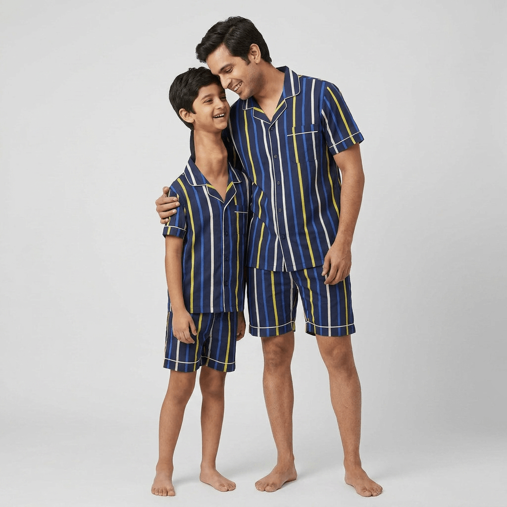 Dad and his mini-me twinning in Blue Yellow Stripes shorts set by Pajama Tribe