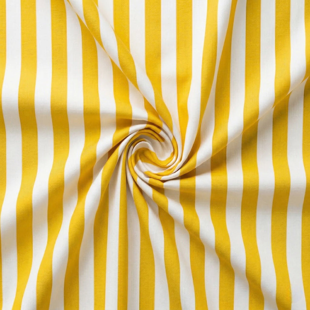 Yellow and white striped fabric in a swirl pattern