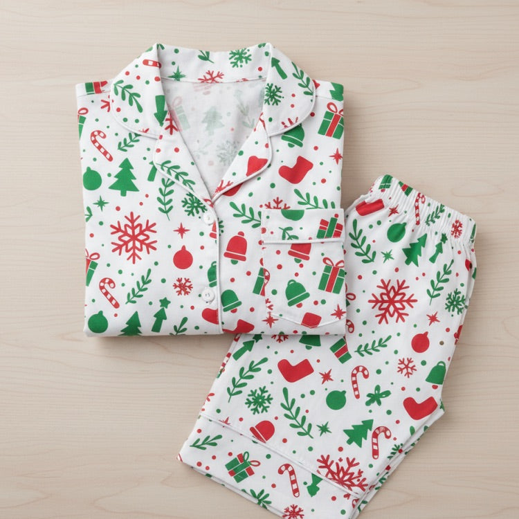 Christmas-themed pajama set with red and green patterns on a beige surface