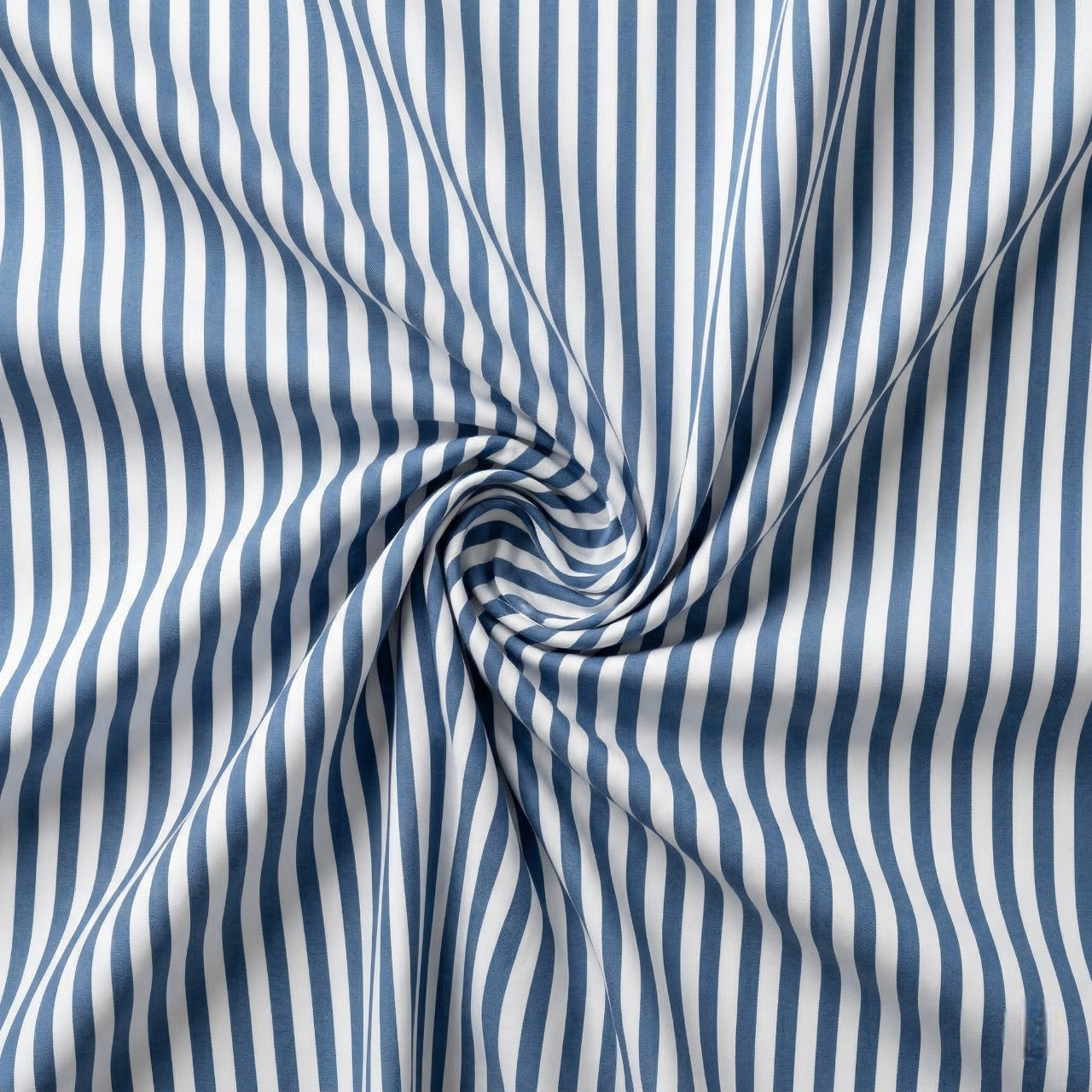 Blue and white striped fabric with a swirl pattern