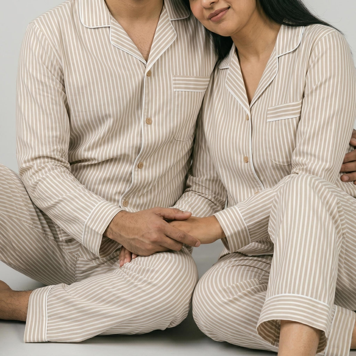Him and her in matching Beige Pin Stripes night suit