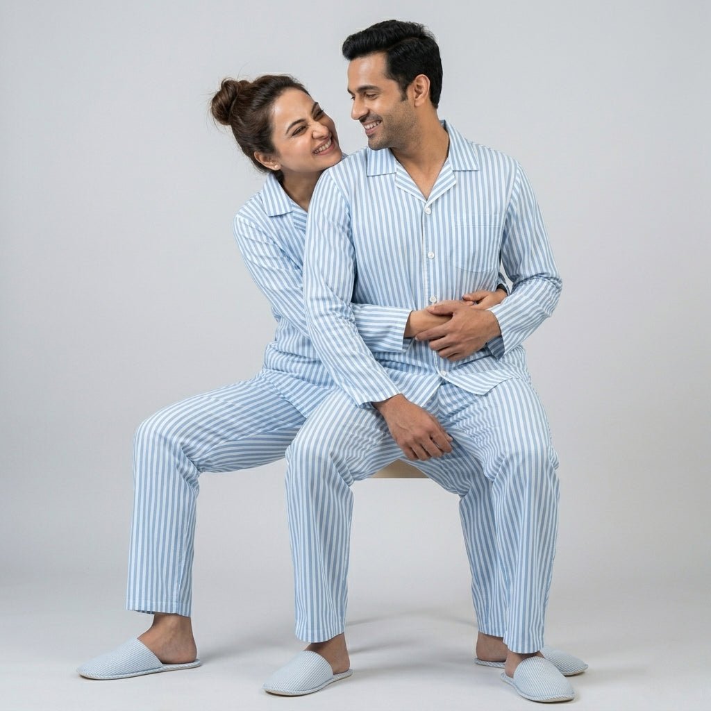 Husband and wife in matching Aqua Blue Classic Stripes night suit