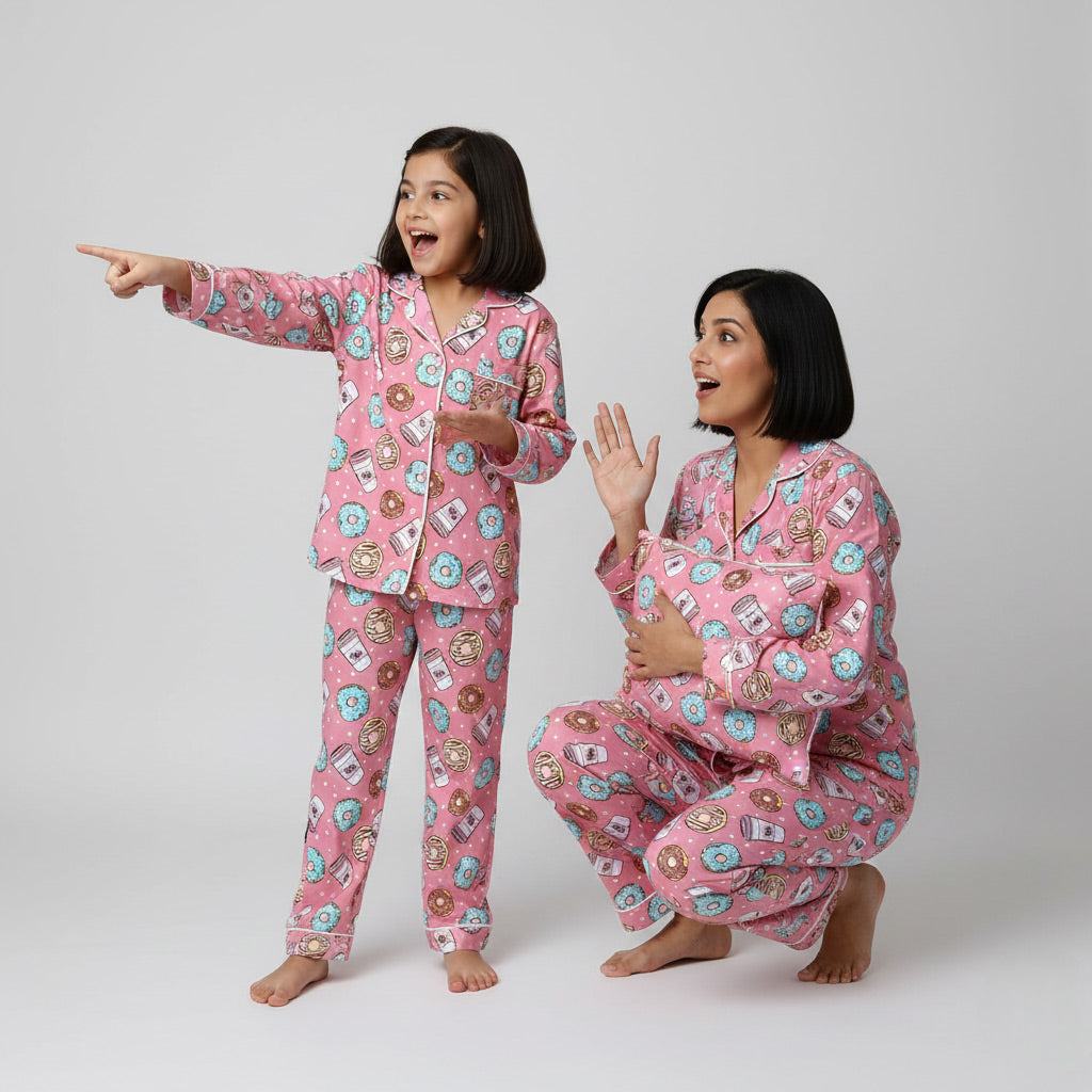 Mother and daughter in donut coffee matching pajama set, sweet treat-inspired coordinated print.