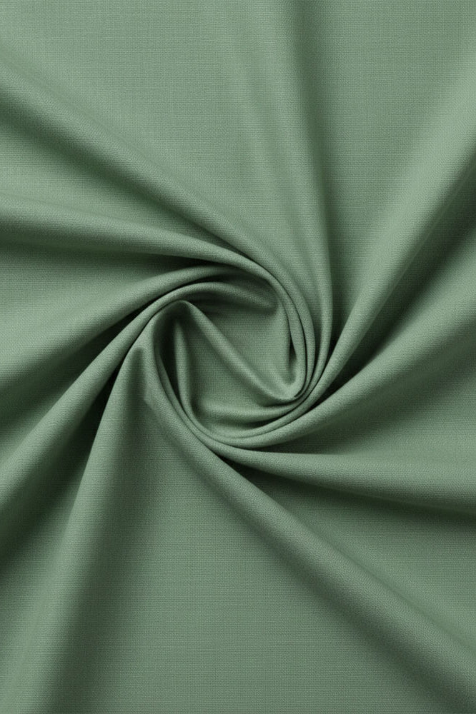 Forest green cotton fabric for rich couple nightwear and cosy stays.