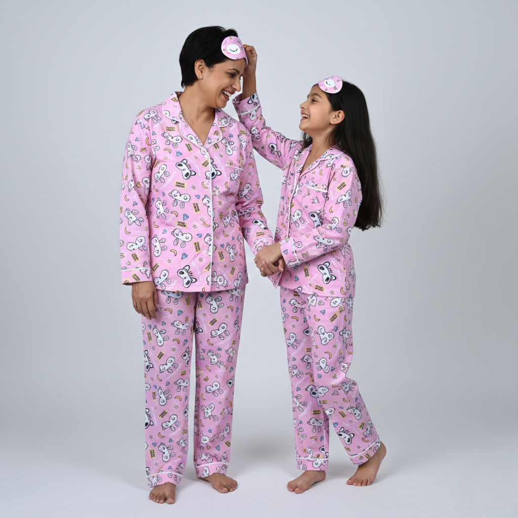 Mother and daughter in Good Night matching pajama set, soft coordinated sleepwear.