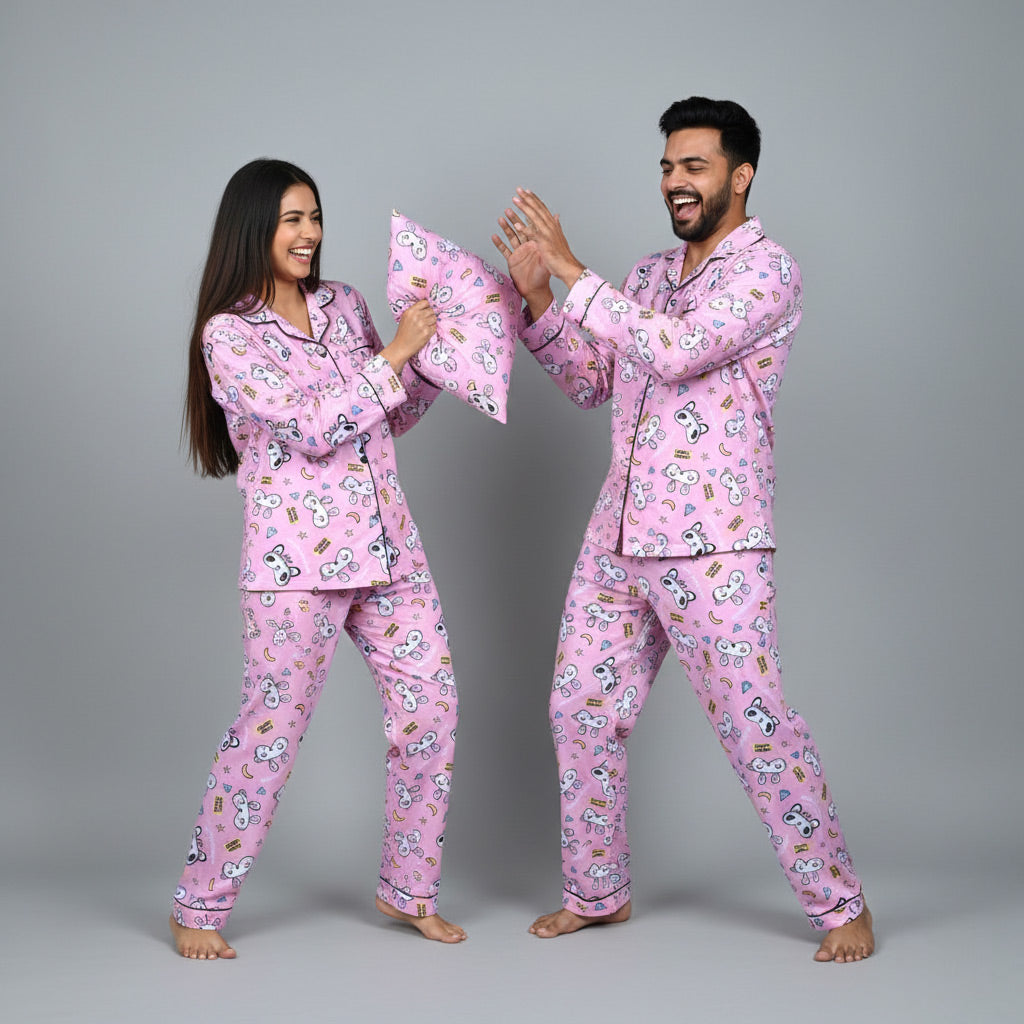 Couple wearing Good Night matching pajamas, soft text-themed coordinated sleepwear.