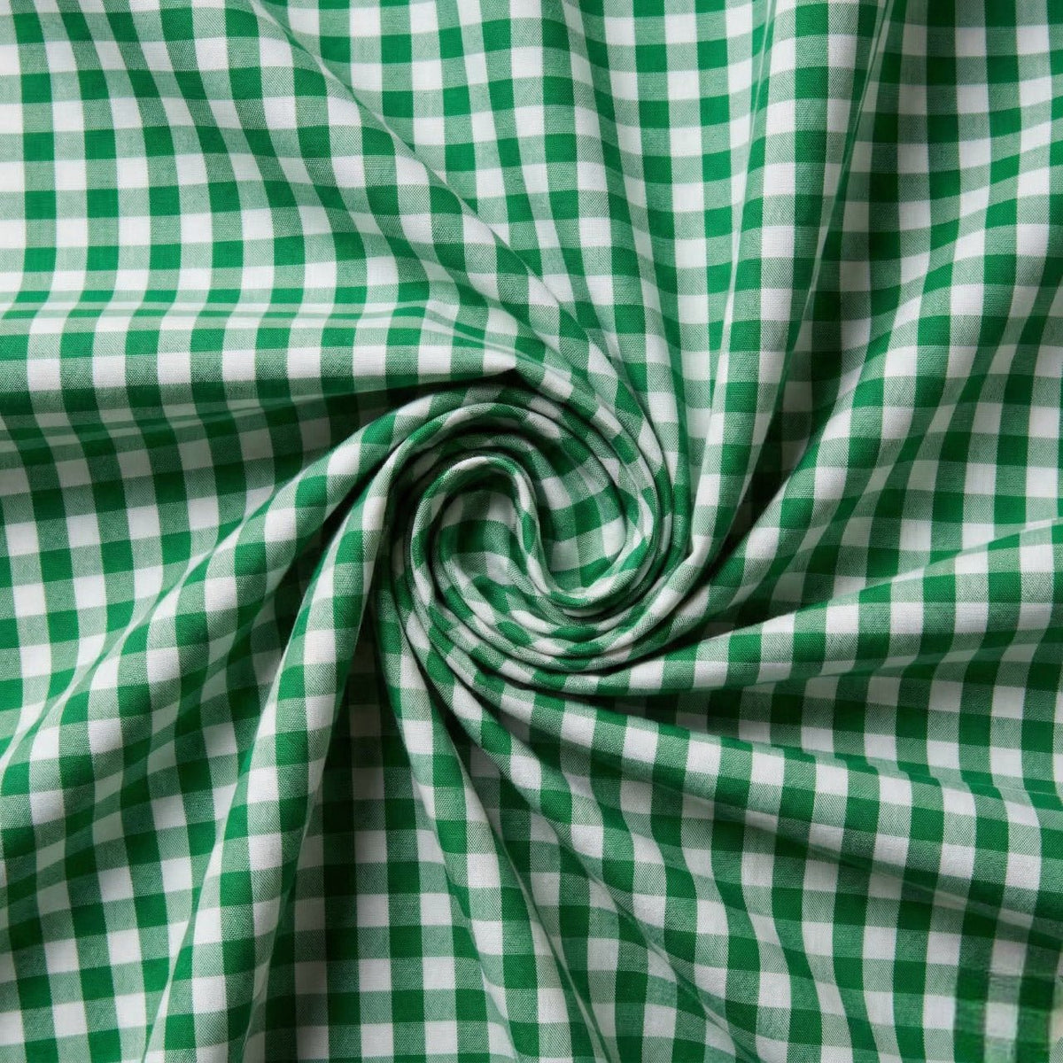 Green and white checkered fabric in a swirl pattern