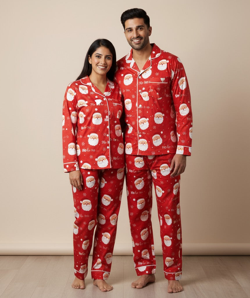 Man and woman wearing red Christmas pajamas with Santa Claus pattern on a beige background