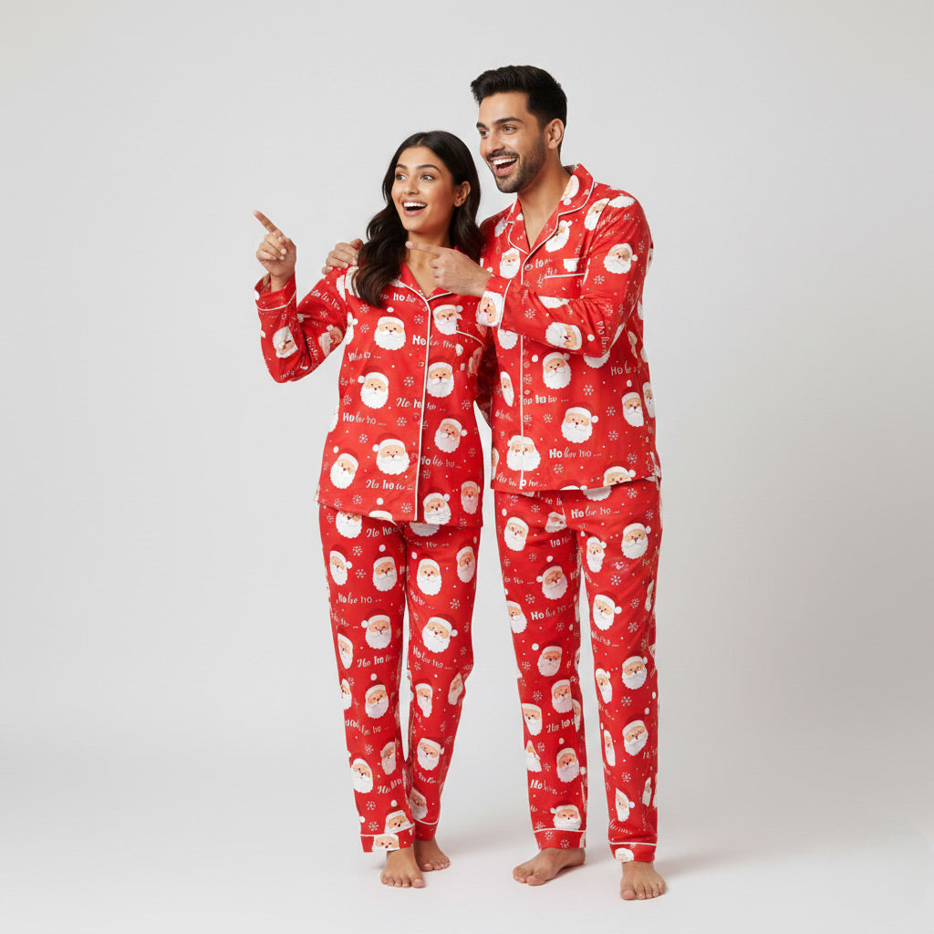 Couple in Ho Ho Ho Santa matching pajama set, festive Christmas-themed coordinated sleepwear.