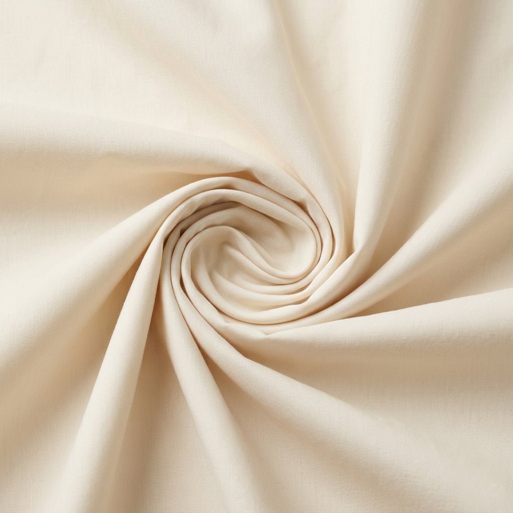 Close-up of the Warm Ivory cotton fabric used in this matching set