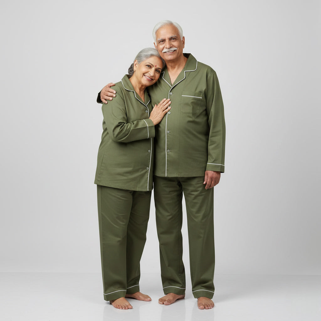 Elderly couple in olive green matching pajama set, comfortable coordinated sleepwear.