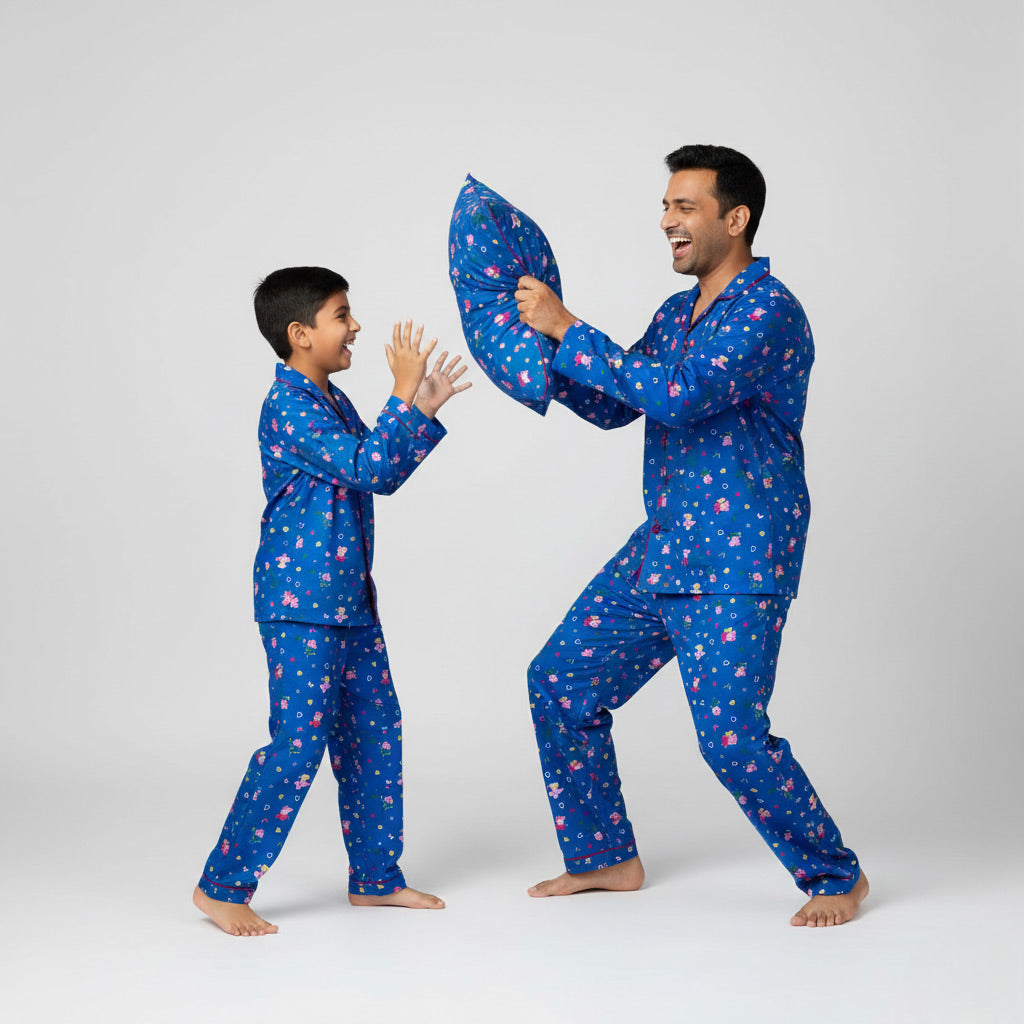 Father and son in Peppa Pig matching pajamas, cartoon-themed coordinated look.