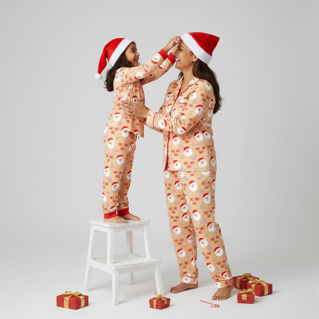 Mother and daughter wearing Peppermint Santa matching pajamas, Christmas-themed coordinated nightwear.