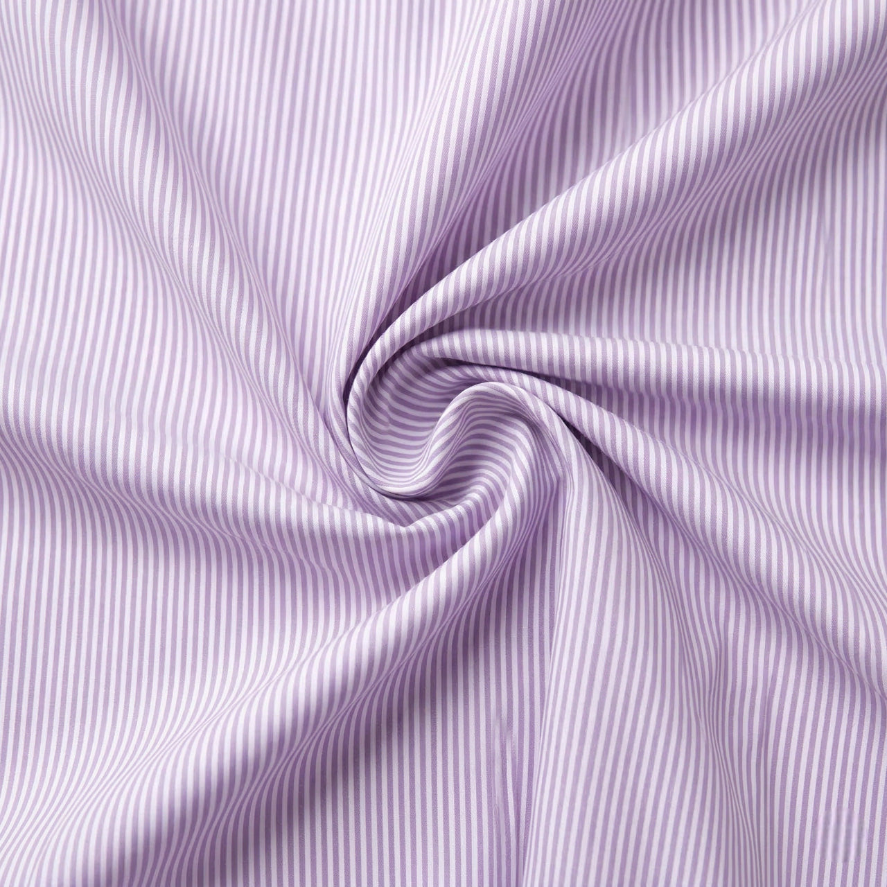 Close-up of purple fabric with a subtle pattern