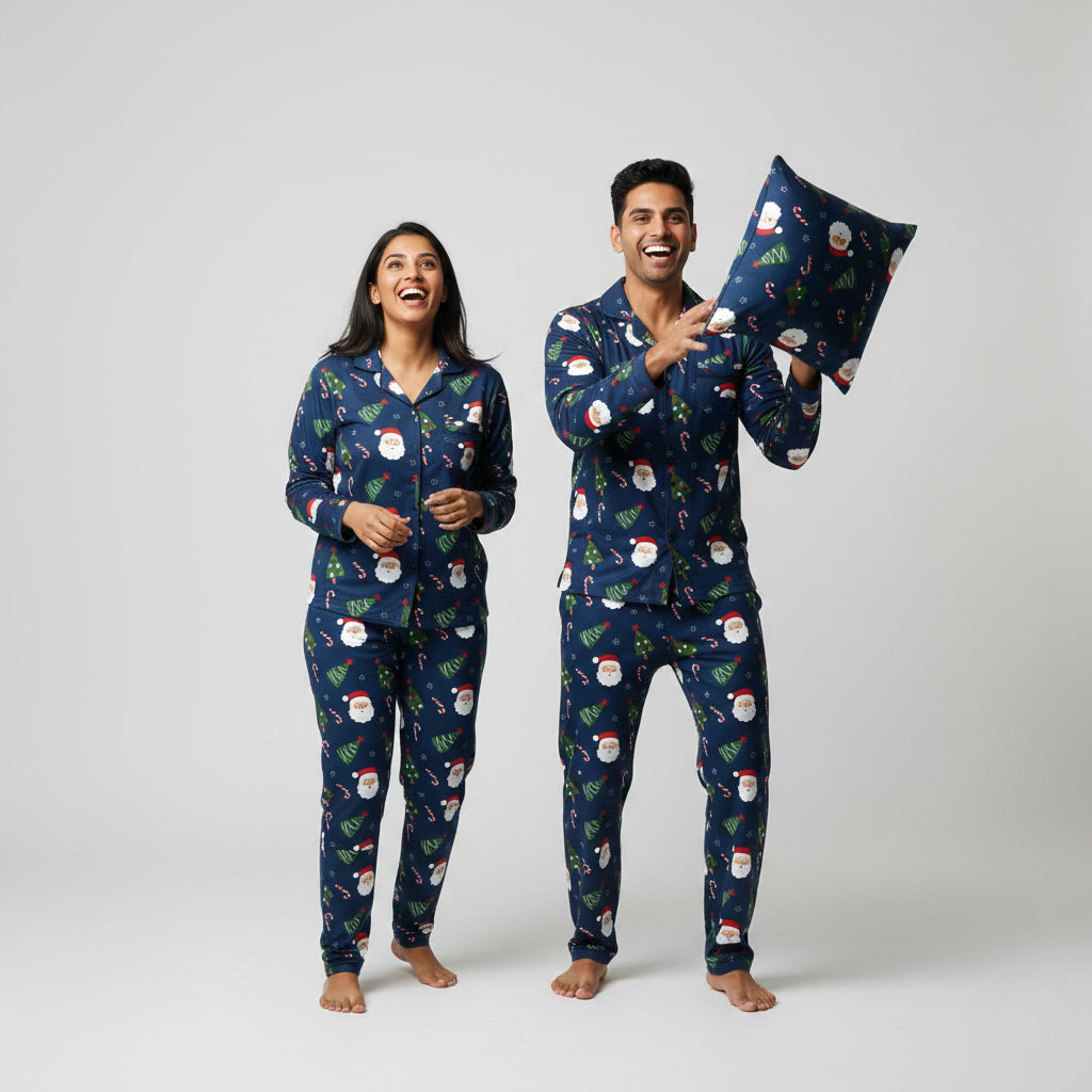 Couple wearing Santa Trees matching pajamas, Christmas-themed coordinated look.