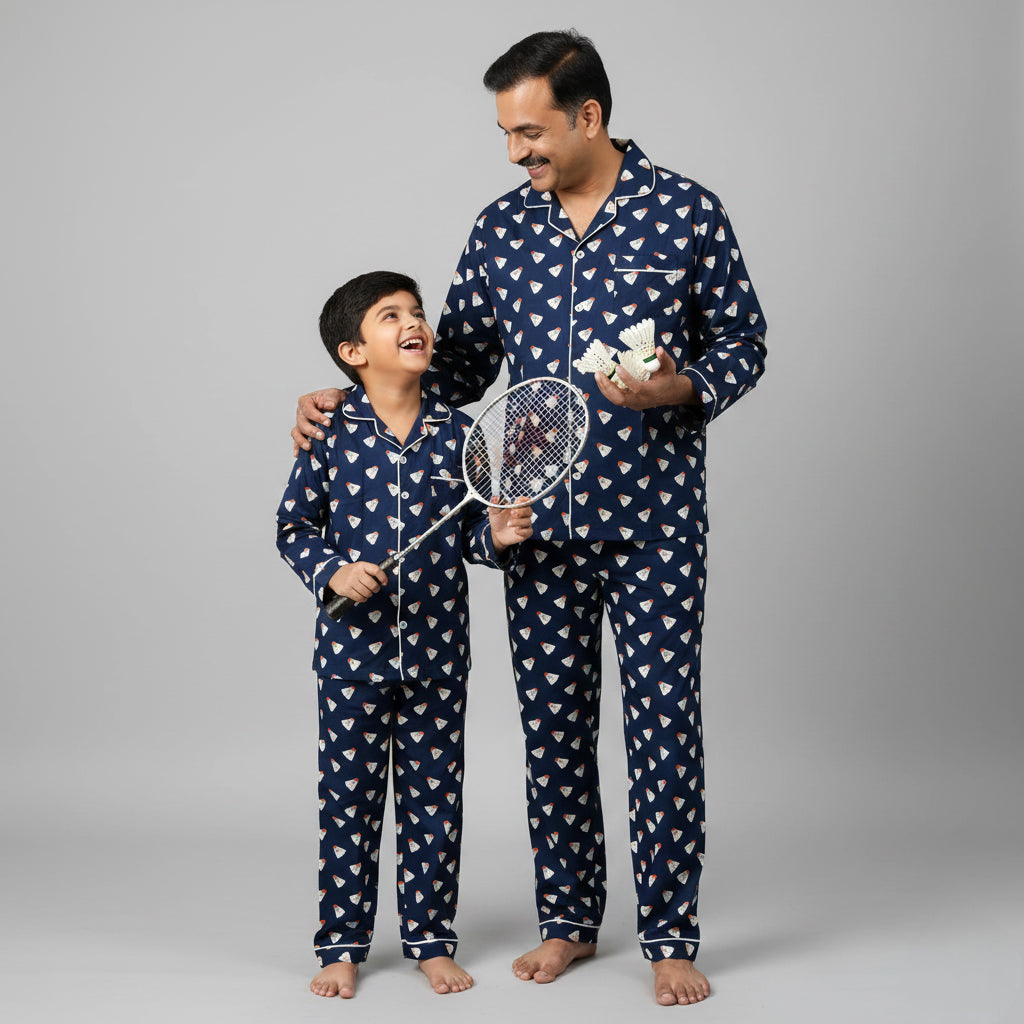 Father and son in shuttlecock print matching pajamas, sports-inspired coordinated look.