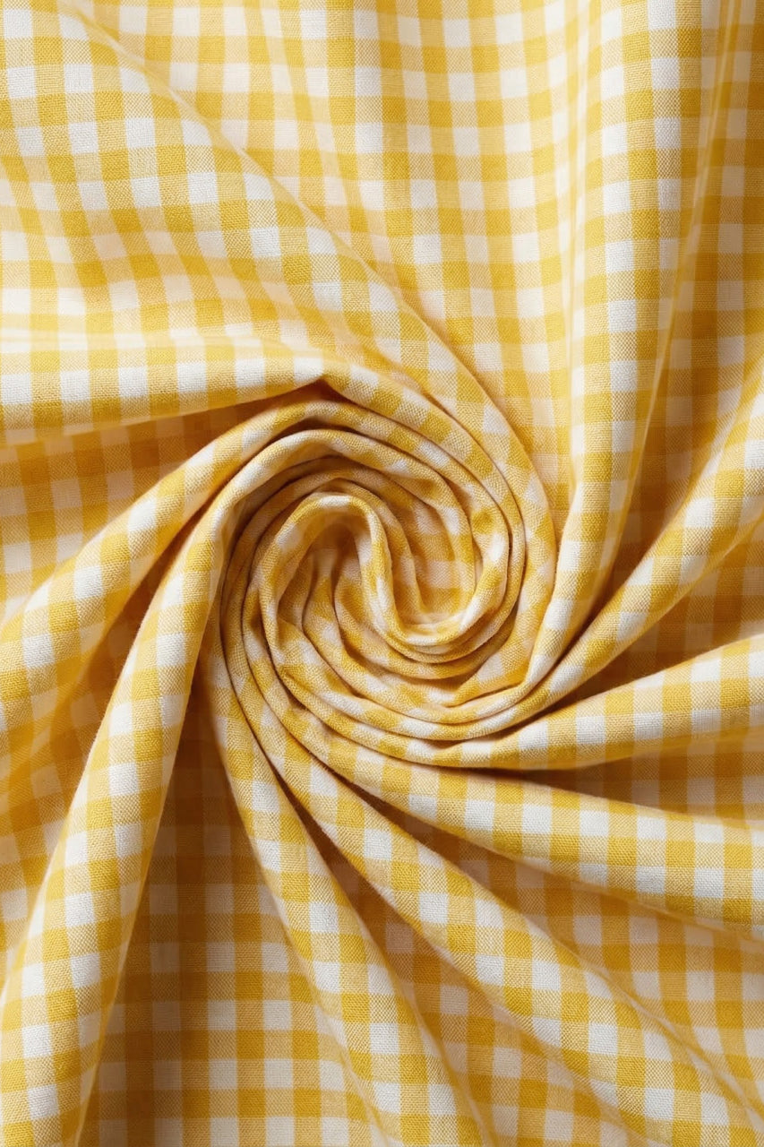 Yellow and white checkered fabric in a swirl pattern