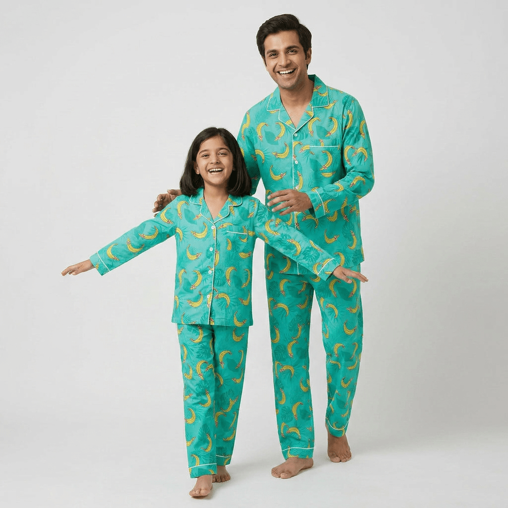 Father and daughter twinning in Tropical Bananas full-sleeve night suit by Pajama Tribe