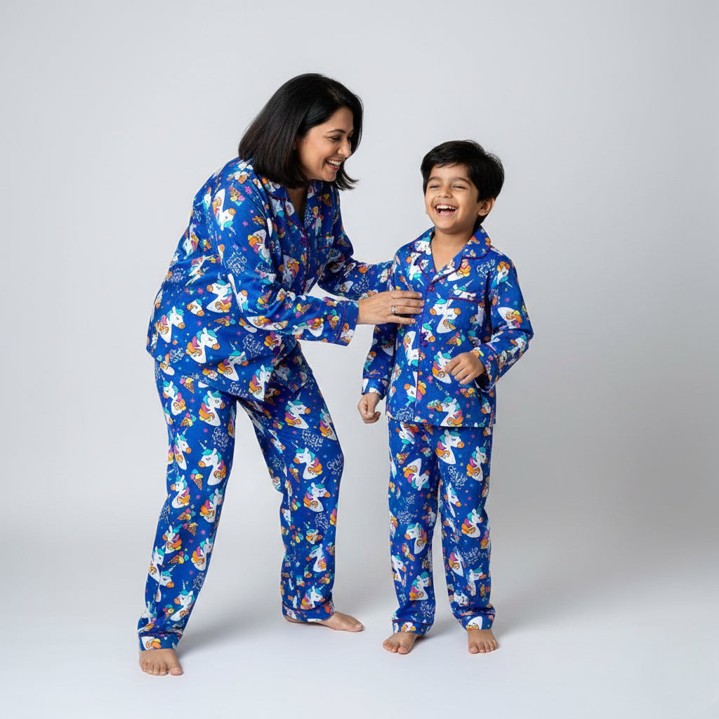 Mother and son in Unicorn in Blues matching pajama set, soft coordinated print.