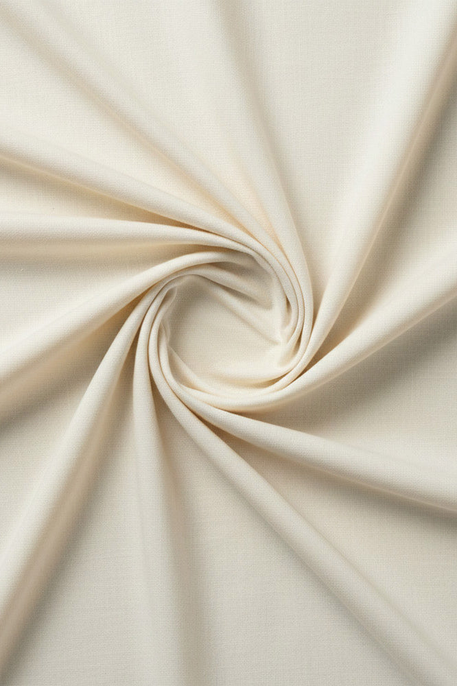 Warm ivory cotton fabric for neutral couple lounge sets and gifting.