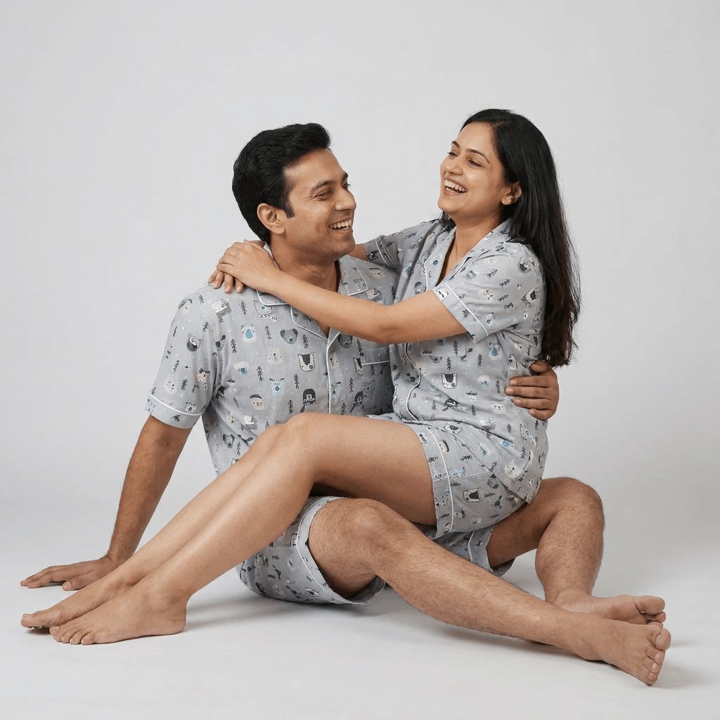 Husband and wife twinning in White Fox shorts set by Pajama Tribe