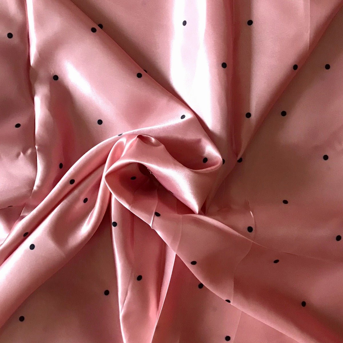 Pink Fling Print in Satin fabric for soft night suits, feminine loungewear, and pastel sleepwear.