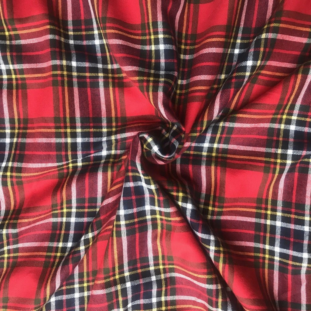 Merry Red Checks in Flannel fabric for winter night suits and festive matching sets.