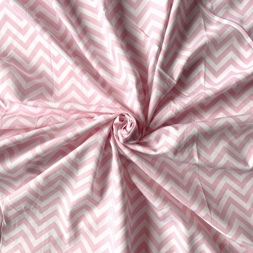 Pink zig zag cotton fabric for trendy night suits, fun sleepwear and casual homewear.