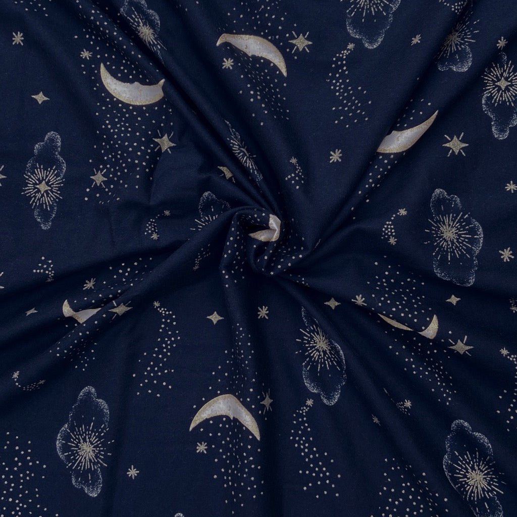 Shining Stars Print in Flannel fabric for space-themed night suits and warm kids’ winter sleepwear.