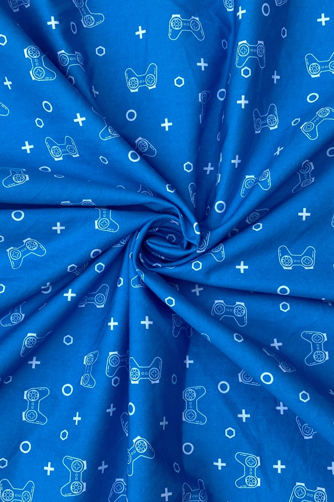 Gamer Dreamer cotton fabric for gamer night suits, teen sleepwear and late-night lounge sessions.