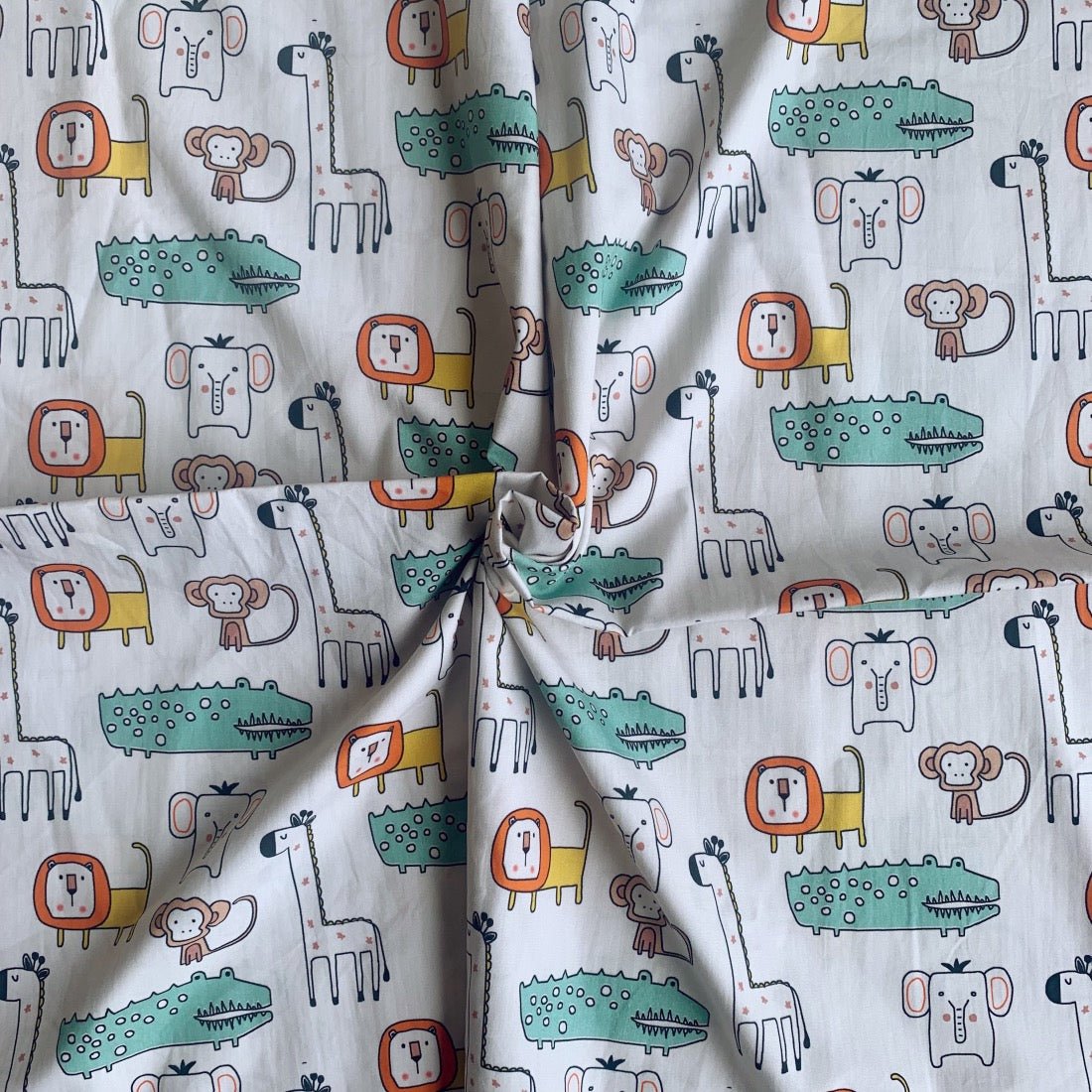Wild Animals cotton fabric for jungle night suits, kids’ sleepwear and adventurous lounge sets.