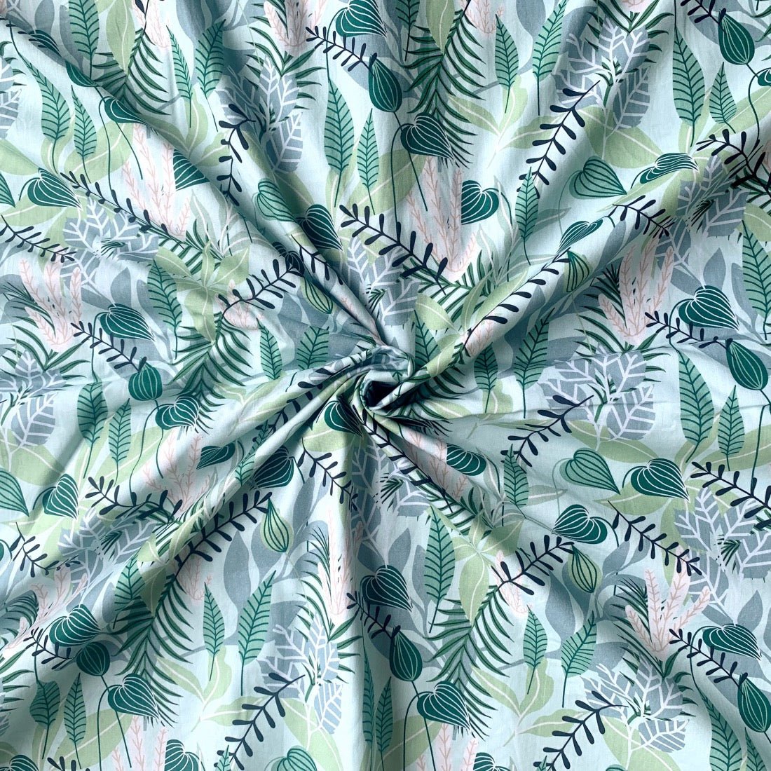 Tropical Garden cotton fabric for nature-inspired night suits, holiday loungewear and relaxed evenings.