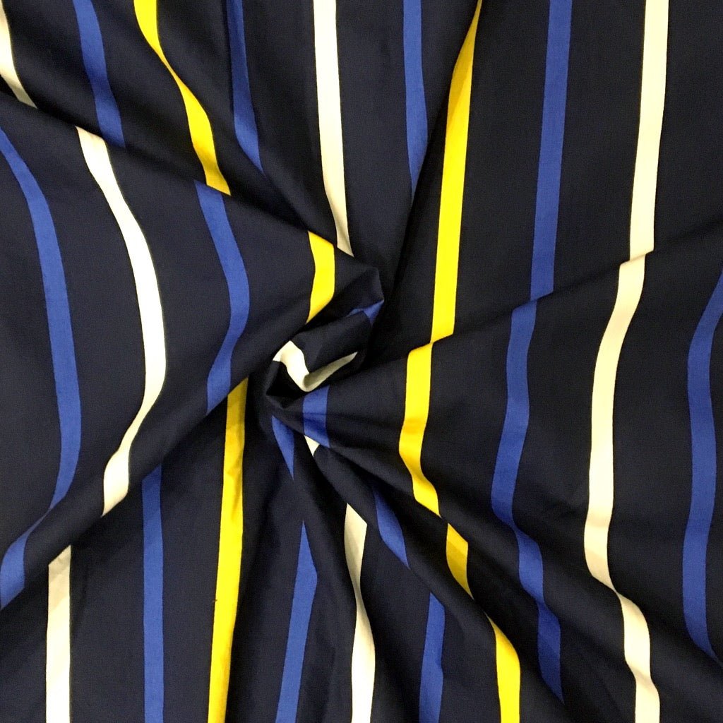 Blue and yellow stripes cotton fabric for playful night suits, casual sleepwear and vacation lounging.