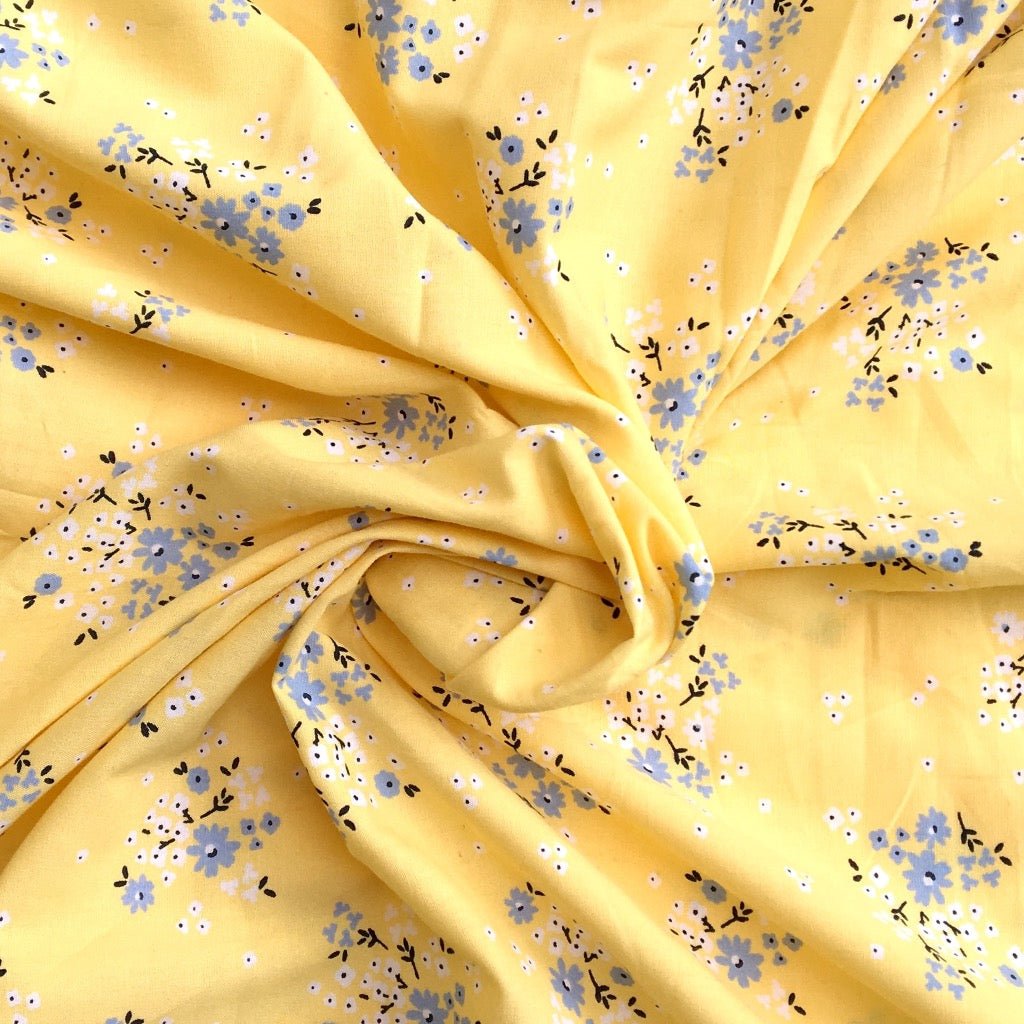 Yellow floral cotton fabric for bright night suits, spring sleepwear and feminine loungewear.