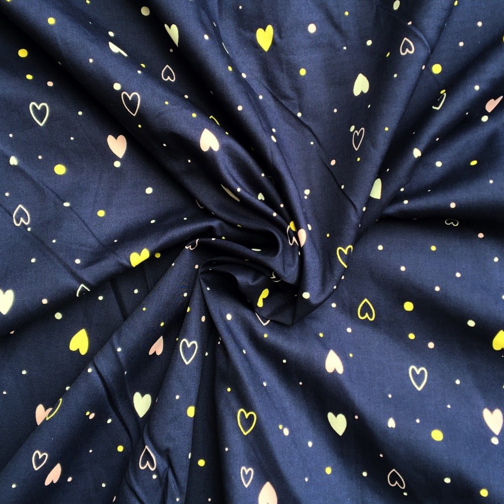 Hearty Delight cotton fabric for heart-print night suits, couple pajamas and anniversary gifting.