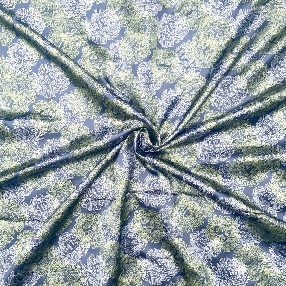 Flower Bed Print in Satin fabric for soft night suits, floral loungewear, and elegant home sleepwear.