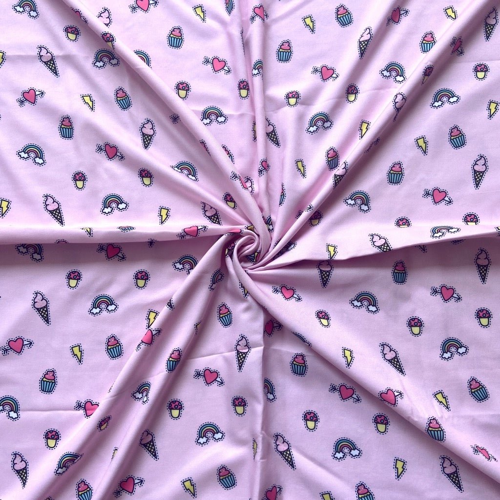 Sweet Treat Print in Rayon fabric for fun themed night suits, colourful matching pajamas, and family sleepwear.
