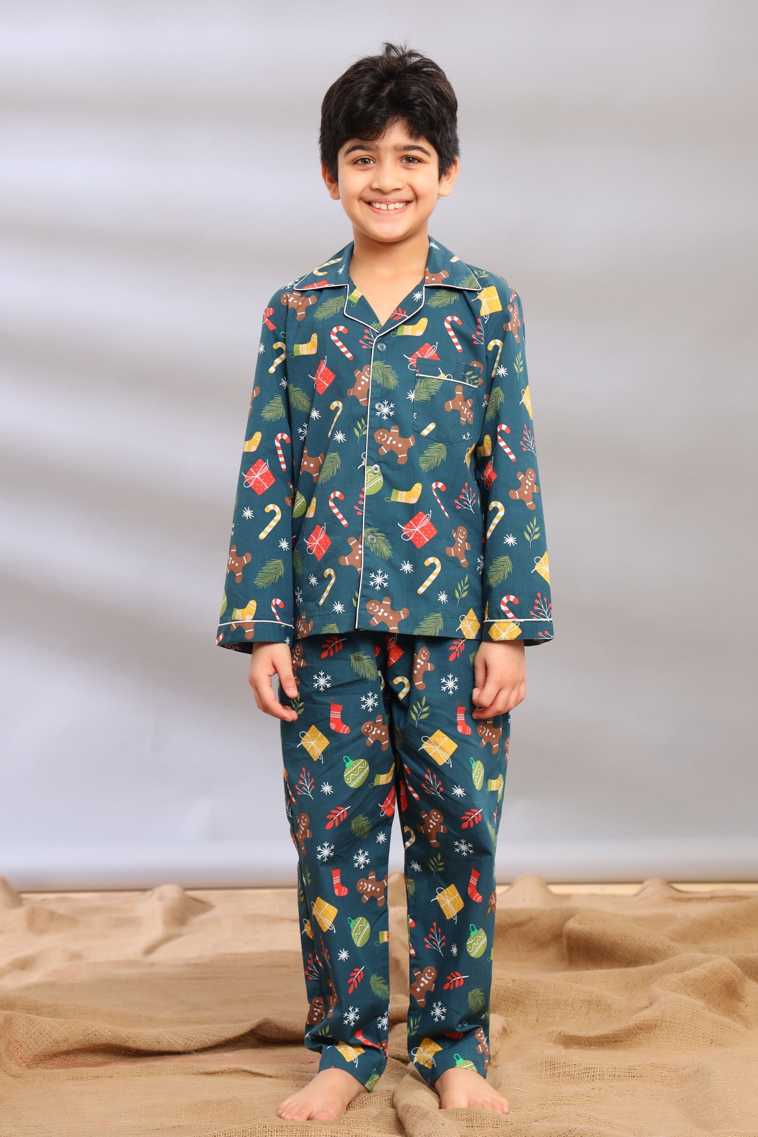 Boy wearing a festive Christmas pajama set in pure cotton