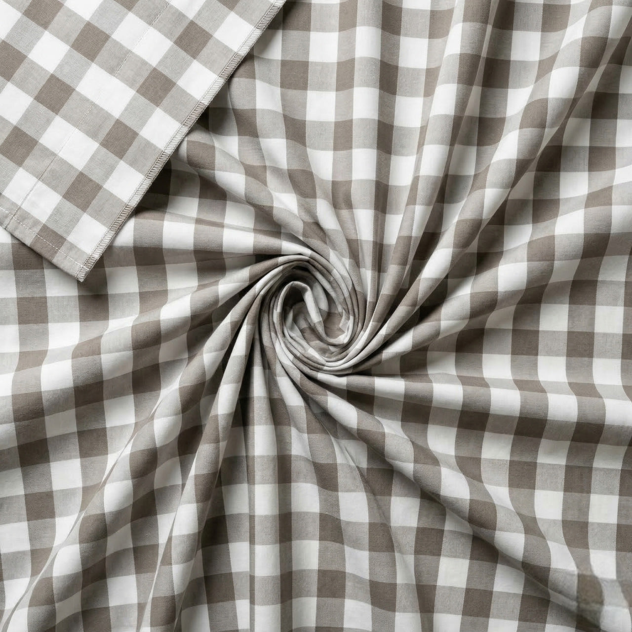 Light grey and white checkered fabric in a swirl pattern