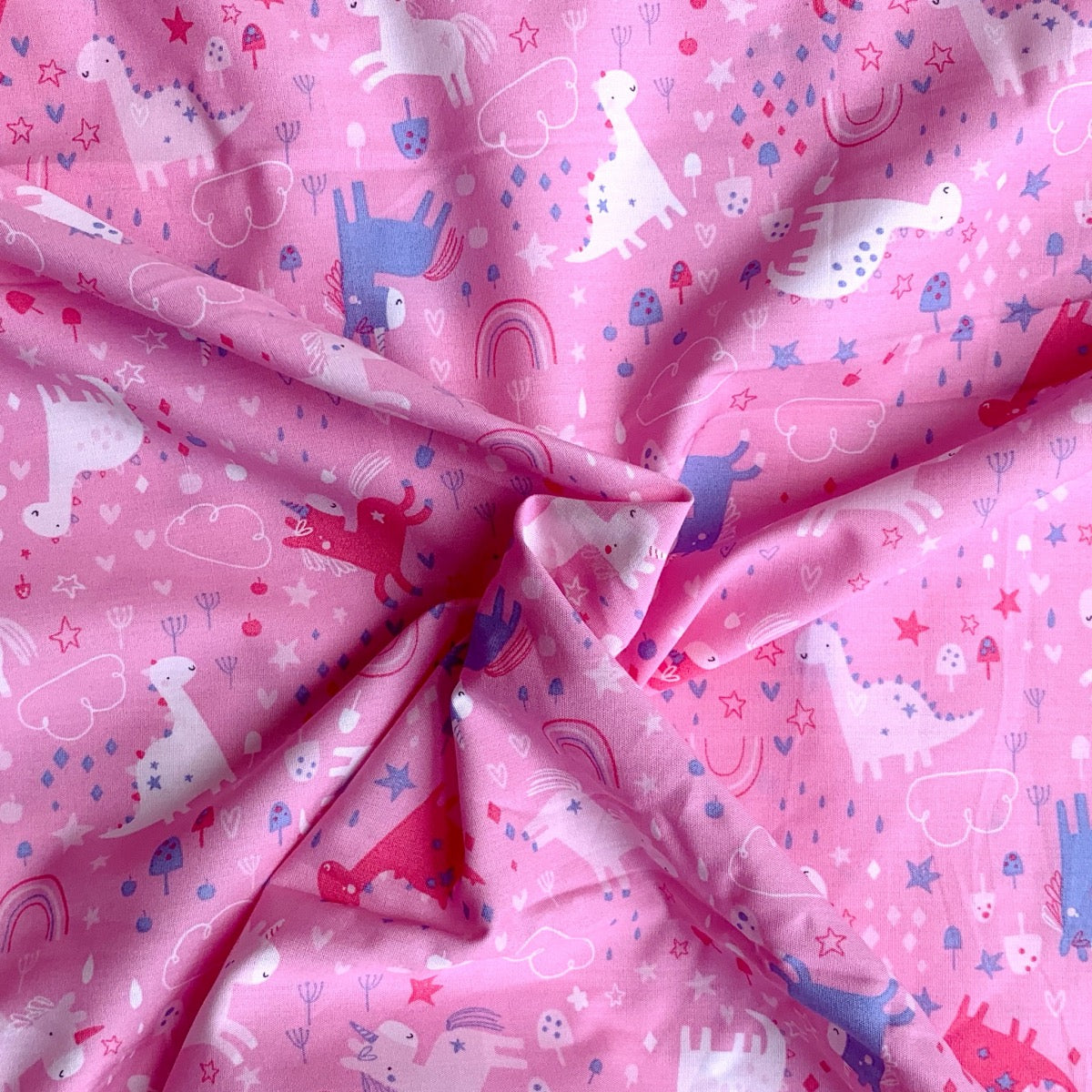 Pink unicorn cotton fabric for magical girls’ night suits, birthday pajamas and gifting sets.