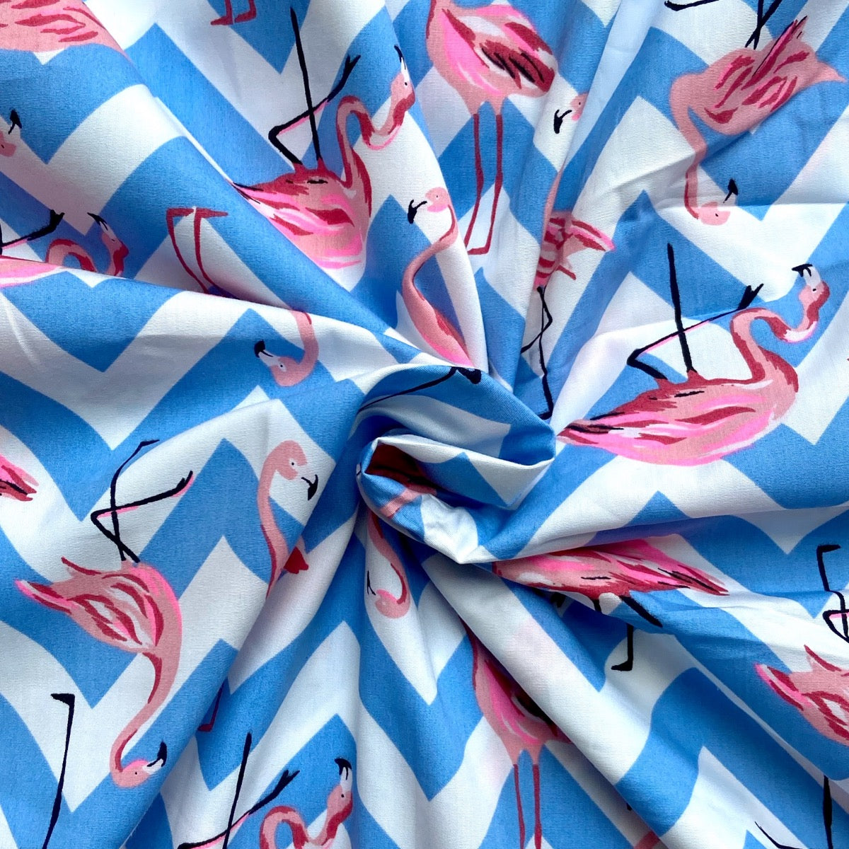 Pink flamingo cotton fabric for tropical night suits, resort-style sleepwear and vacation loungewear.