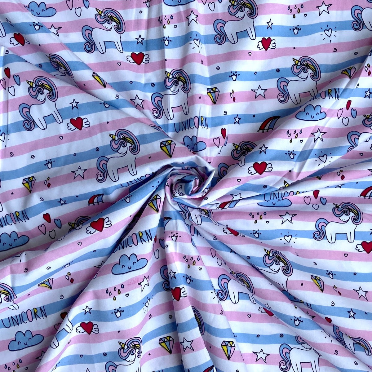 Unicorn in stripes cotton fabric for magical night suits, cute girls’ pajamas and gifting sets.