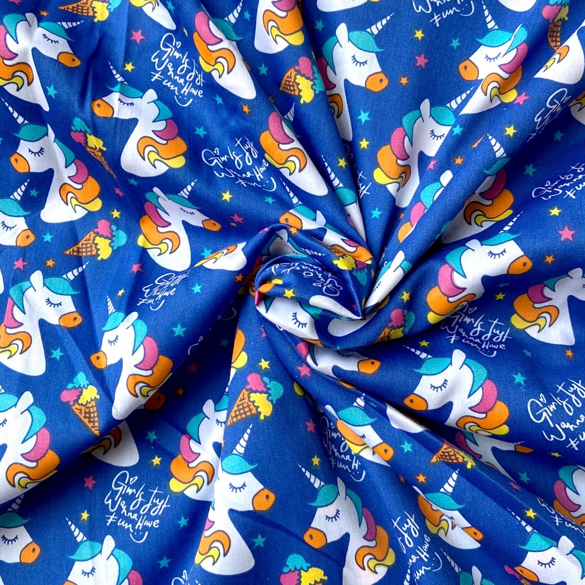 Unicorn in blue cotton fabric for dreamy kids’ night suits, birthday sleepwear and sleepover pajamas.