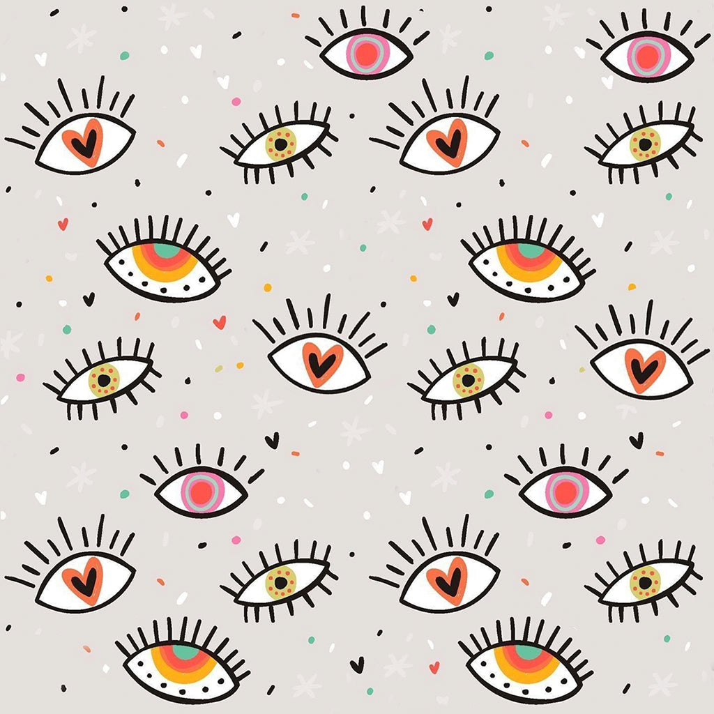 Illustrated eye motif fabric print with subtle hearts for statement nightwear